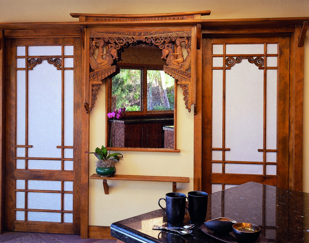 Rice paper Shoji screens  with a mirror frame spanning the two.